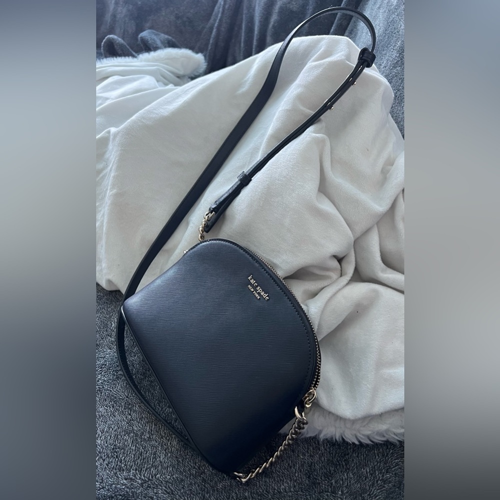 - Navy blue Kate Spade crossbody purse